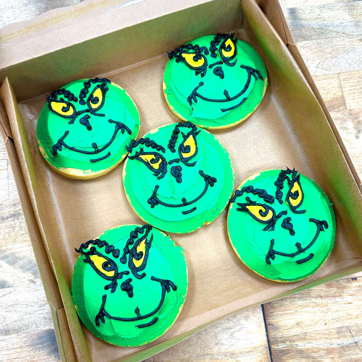 Box of Dozen 5oz Cookies - Frosted Sugar Cookie Grinch Face